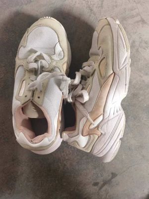 Used international brand sneakers in sizes 37-39 in various colors