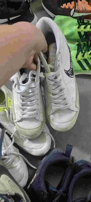 Used branded men's sneakers in various colors, size 40 and up